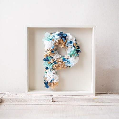 letra de flores azul